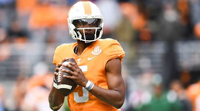 Hendon Hooker holding the ball for Tennessee